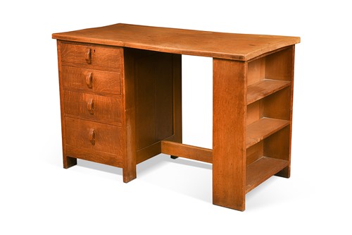 Lot 190 - A Cotswold School single pedestal oak and elm desk by Crossley & Brown, circa 1925