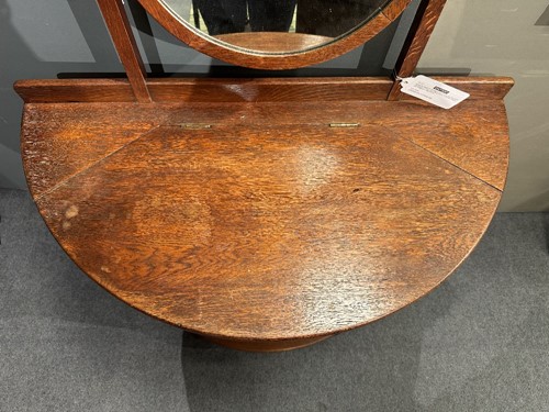 Lot 201 - A rare demi-lune oak dressing table by Heal & Son, circa 1910