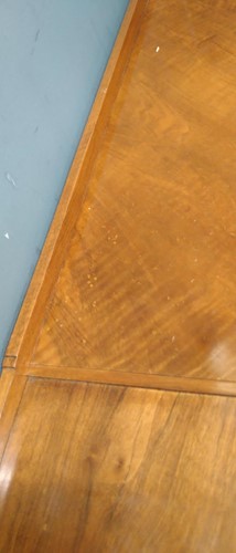 Lot 235 - A Heal's walnut corner desk, circa 1930