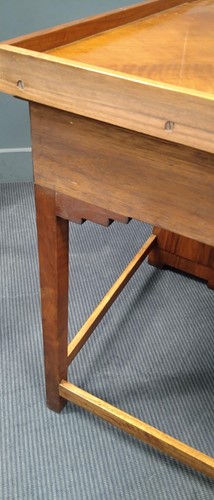 Lot 235 - A Heal's walnut corner desk, circa 1930