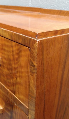 Lot 235 - A Heal's walnut corner desk, circa 1930