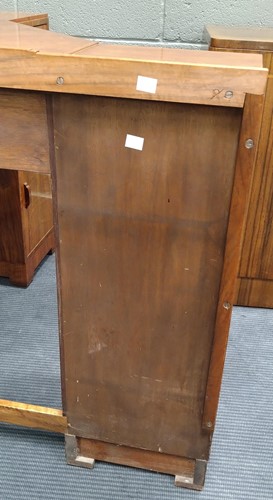 Lot 235 - A Heal's walnut corner desk, circa 1930