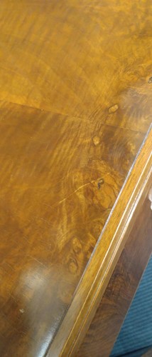 Lot 235 - A Heal's walnut corner desk, circa 1930