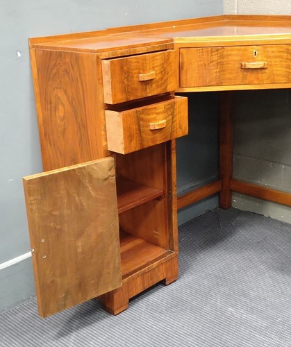 Lot 235 - A Heal's walnut corner desk, circa 1930