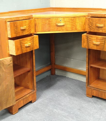 Lot 235 - A Heal's walnut corner desk, circa 1930