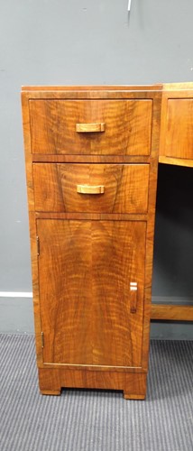 Lot 235 - A Heal's walnut corner desk, circa 1930