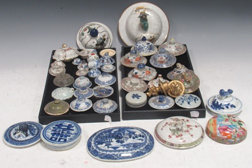 Lot 95 - A collection of Chinese covers from teapots,...