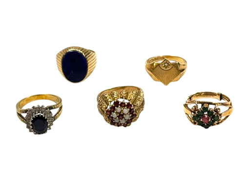 Lot 386 - Four hallmarked or assessed 9ct gold rings,...