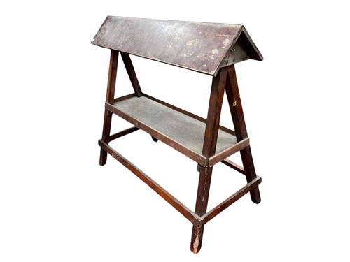 Lot 677 - A 20th century wooden saddle stand or rack....
