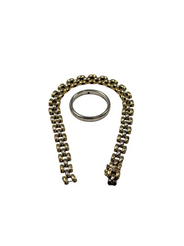 Lot 392 - A hallmarked 9ct gold brick link bracelet...