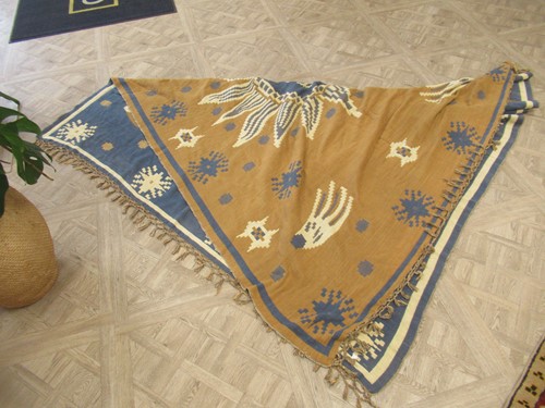 Lot 252 - A decorative hand-woven wall hanging or bedspread