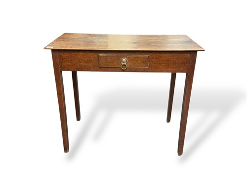 Lot 696 - A Georgian oak side table on square legs with...