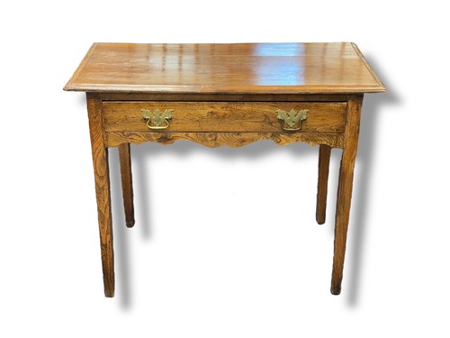 Lot 700 - An early 19th century elm side table with long...