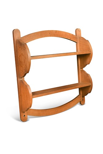 Lot 206 - A set of wall mounted oak bookshelves by Heal & Son, circa 1920
