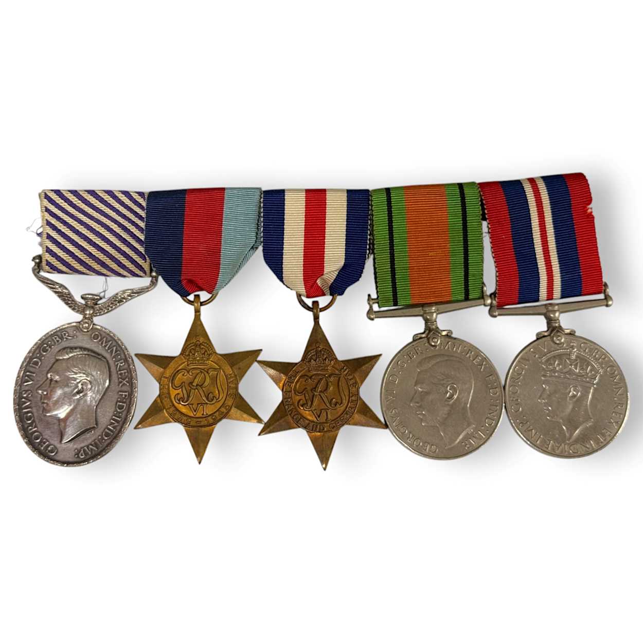 Lot 221 - A World War Two Distinguished Flying Medal (DFM) group of five