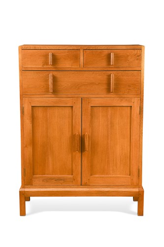 Lot 194 - After Edward Barnsley CBE (1900-1987), a Cotswold School oak tallboy, circa 1930s