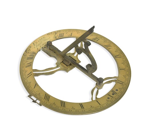 Lot 668 - A brass sundial, 18th century