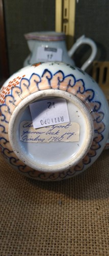 Lot 17 - A Chinese export sparrow beak jug and cover,...