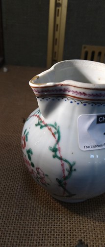 Lot 17 - A Chinese export sparrow beak jug and cover,...