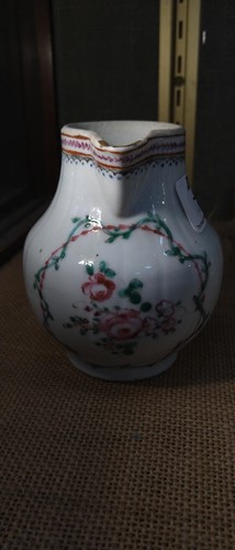 Lot 17 - A Chinese export sparrow beak jug and cover,...