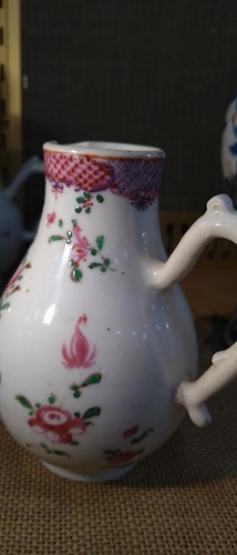 Lot 17 - A Chinese export sparrow beak jug and cover,...
