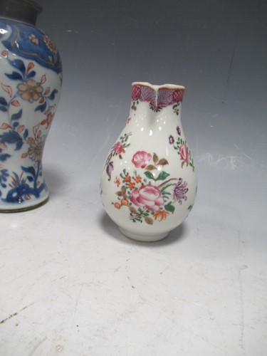 Lot 17 - A Chinese export sparrow beak jug and cover,...