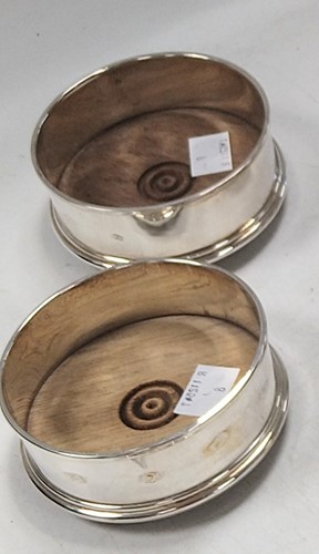 Lot 359 - A pair of small wine coasters with wooden...
