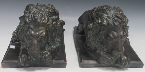 Lot 55 - A pair of bronzed terracotta models of...