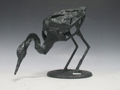 Lot 50 - A bronzed metal skeletal model of a heron or...
