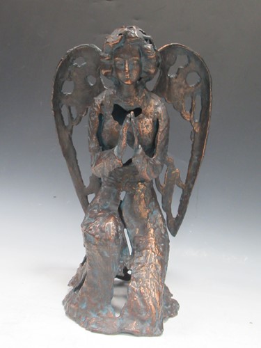 Lot 210 - A bronzed metal and patinated skeletal model...