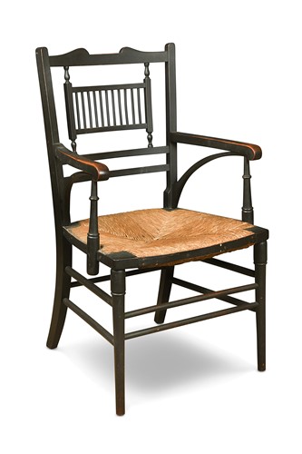 Lot 178 - In the manner of E. W, Godwin, an Aesthetic period ebonised elbow chair