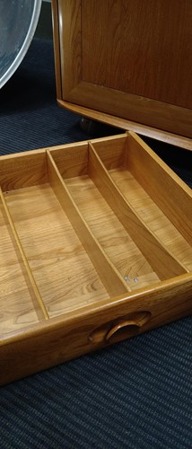 Lot 274 - An Ercol 'Windsor' elm bookcase
