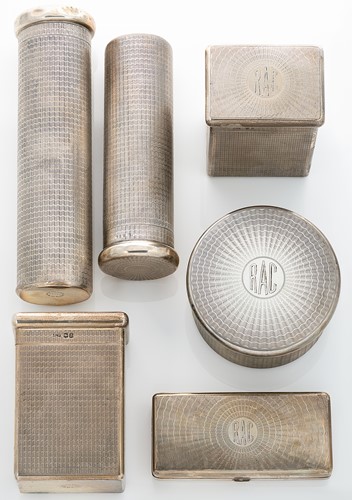 Lot 347 - A George V silver gentleman's 5-piece travelling toilet set with one addition