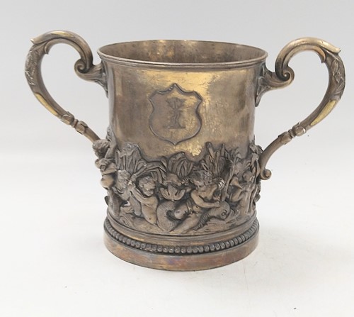 Lot 358 - A large (originally) gilded two handled cup...