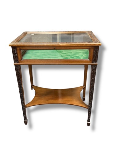 Lot 748 - An Edwardian Bijouterie table with blind fret...