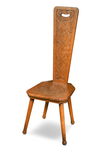 Lot 174 - An Arts & Crafts carved oak spinning chair