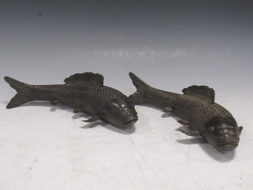 Lot 50 - A pair of models of carp, the metal with...