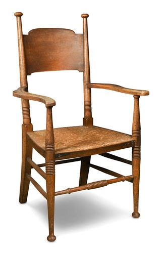 Lot 179 - Attributed to E. G. Punnett for William Birch, an Arts & Crafts oak elbow chair