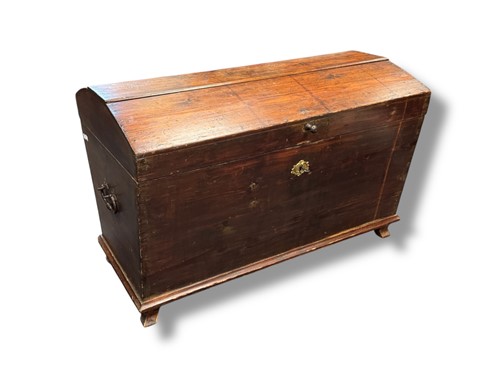 Lot 705 - A Continental pitch pine domed topped trunk,...