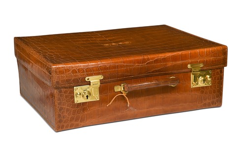 Lot 725 - A crocodile leather travelling case by Goldsmiths & Silversmiths Co., London