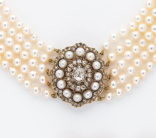 Lot 41 - A five row cultured pearl necklace with a diamond set clasp
