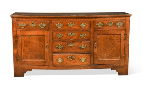 Lot 431 - A George III elm and fruitwood dresser base