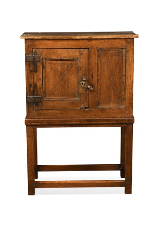 Lot 392 - An oak livery cabinet, early 18th century