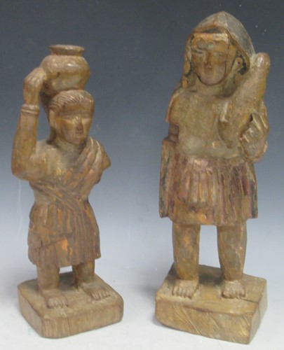 Lot 189 - A pair of Colonial carved wood figures, late...
