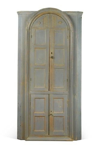 Lot 473 - A blue painted pine barrel back corner cupboard, possibly Irish 19th century