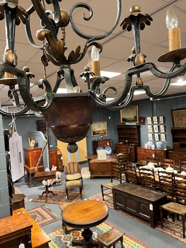 Lot 395 - A French wrought iron six light chandelier, early 20th century