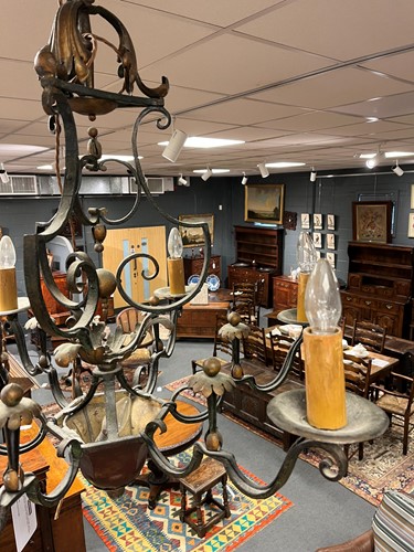 Lot 395 - A French wrought iron six light chandelier, early 20th century