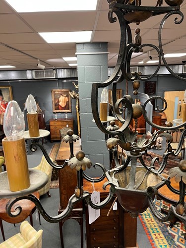 Lot 395 - A French wrought iron six light chandelier, early 20th century