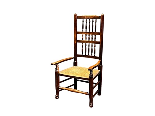 Lot 628 - A 19th century spindle back armchair with rush...