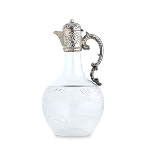 Lot 474 - A Victorian silver mounted glass claret jug
